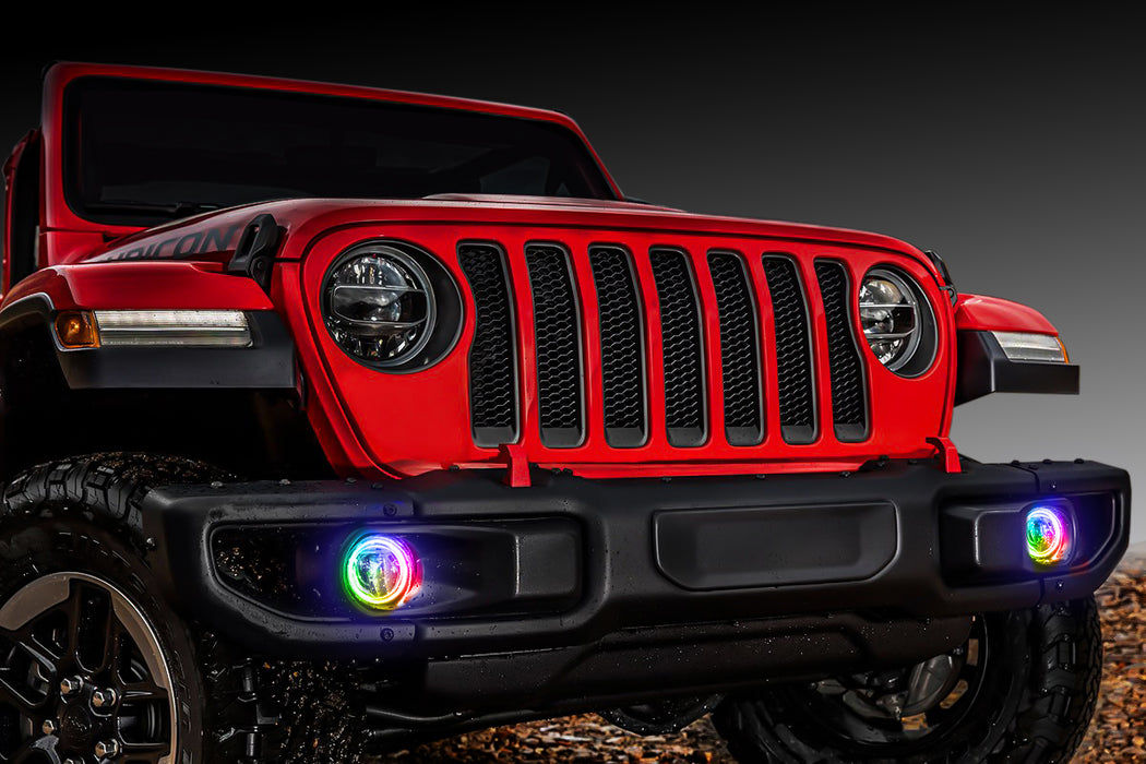 Front end of a red Jeep with rainbow LED Surface Mount Fog Light Halos.