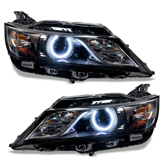 Chevrolet Impala headlights with white halo rings.