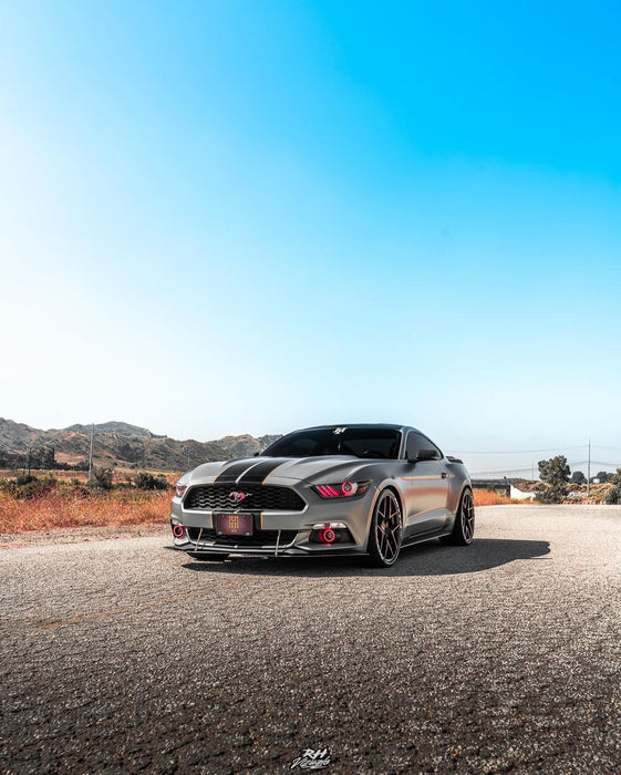 Lifestyle image of silver mustang with red halos and DRL accents