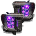 GMC Sierra headlights with purple demon eye projectors.