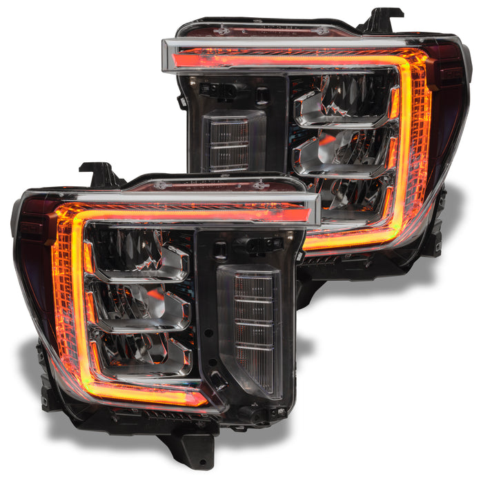 GMC Sierra headlights with amber DRLs.