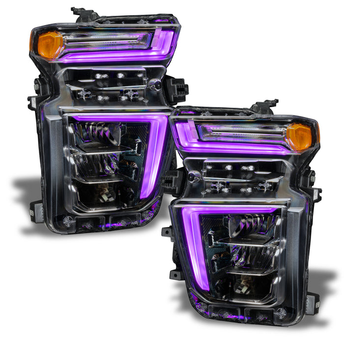 Chevrolet Silverado headlights with purple DRLs.