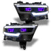 Ram 1500 headlights with purple demon eye projectors.