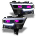 Ram 1500 headlights with pink demon eye projectors.