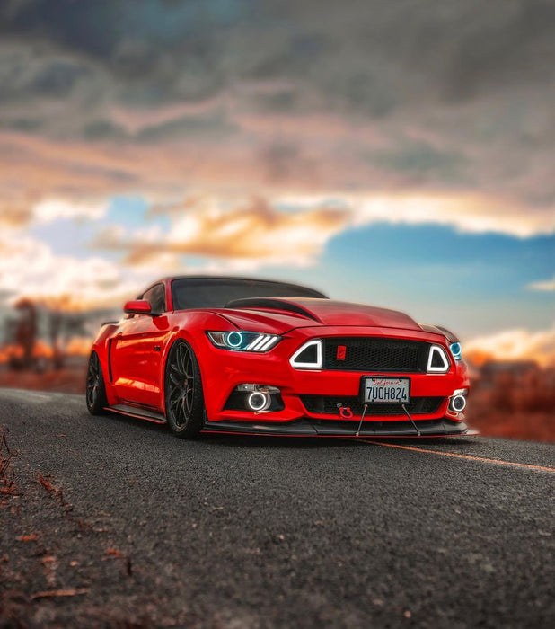 Lifestyle image of red mustang with white halos and DRL
