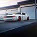 White dodge challenger with red headlight and fog light halos