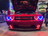 Front end of a Dodge Challenger with multicolored halos/