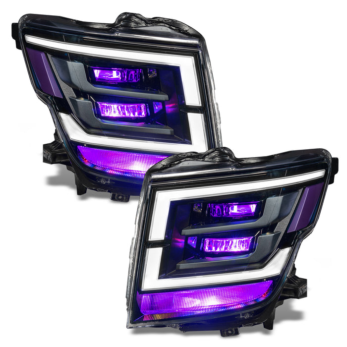 2021-2024 Nissan Titan headlights with purple demon eye projectors.