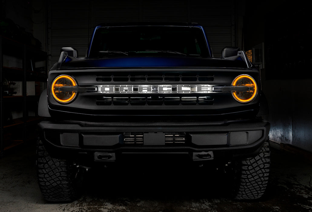 Front view of a Ford Bronco with amber halo headlights.