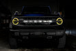 Front view of a Ford Bronco with yellow halo headlights.