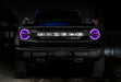 Front view of a Ford Bronco with pink halo headlights.