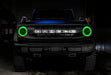 Front view of a blue Ford Bronco with green headlight halos.