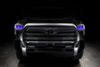  Straight front view of a black Toyota Tundra with purple demon eye projectors.
