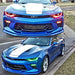 Two different views of a Chevrolet Camaro; one with red headlight DRLs, and one with green headlight DRLs.