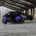 Black Camaro with purple DRLs.