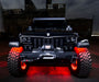 Front view of a Jeep Wrangler with Black Series - 7D 50” 288W Dual Row LED Light Bar installed on the windshield.