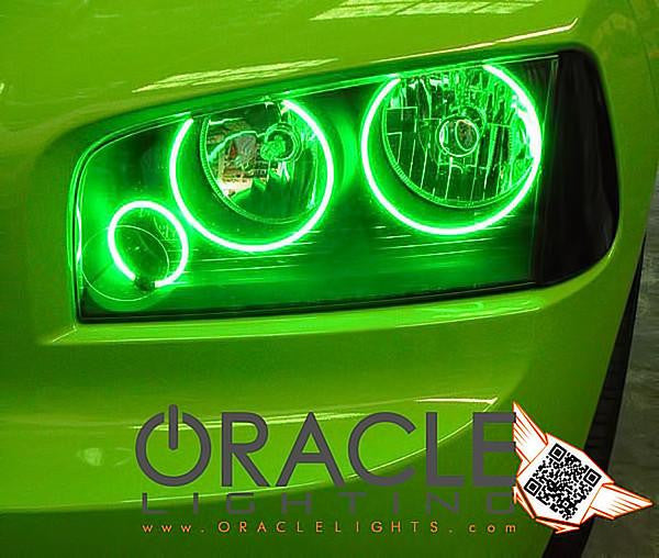Close-up of charger headlight with green halos