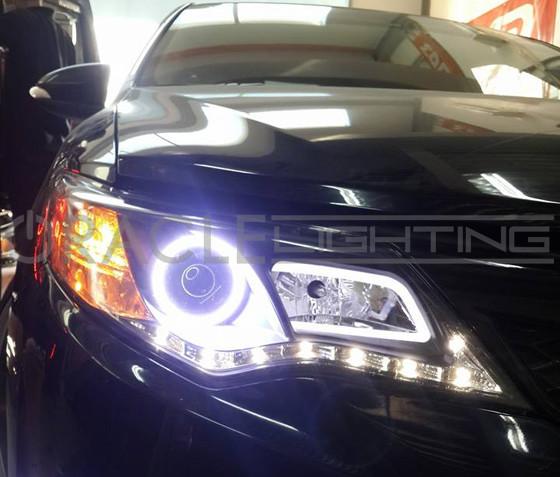 Close-up of 2012-2015 Toyota Camry XV50 ORACLE Halo Kit installed on a Toyota Camry headlight.