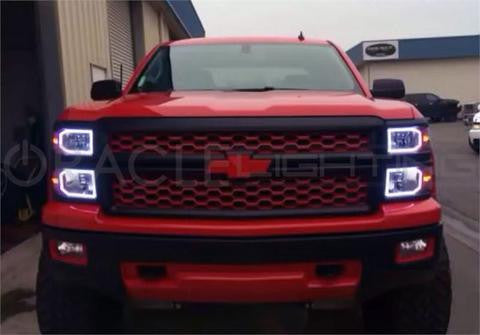 Front view of a Chevrolet Silverado with white LED headlight halo rings installed.