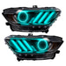 Ford Mustang headlights with cyan halos and DRLs.