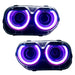Dodge Challenger headlights with purple LED halo rings.