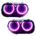 Dodge Challenger headlights with pink LED halo rings.