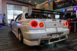 Close-up on the rear end of a Nissan Skyline with LED Tail Light Halo Rings installed.