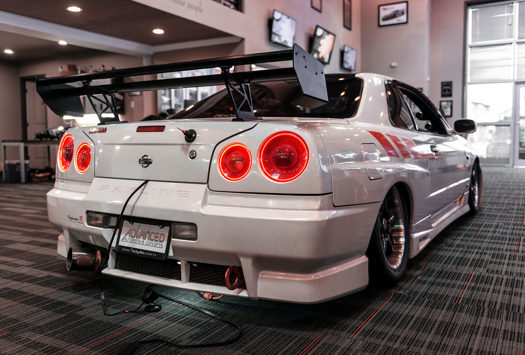 Close-up on the rear end of a Nissan Skyline with LED Tail Light Halo Rings installed.