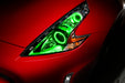 Nissan 370Z headlight with green LED halo rings installed.