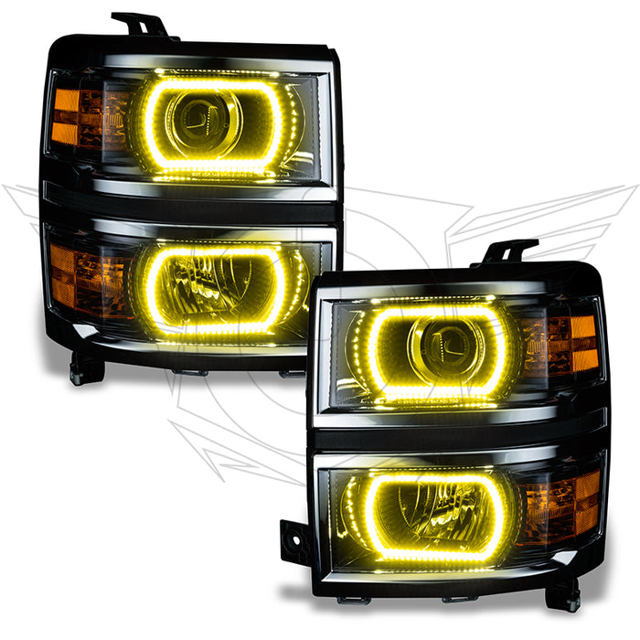Chevrolet Silverado headlights with yellow LED halo rings.
