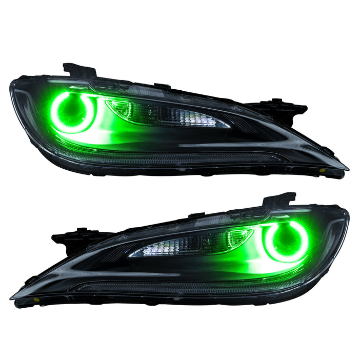 Chrysler 200 headlights with green LED halo rings.