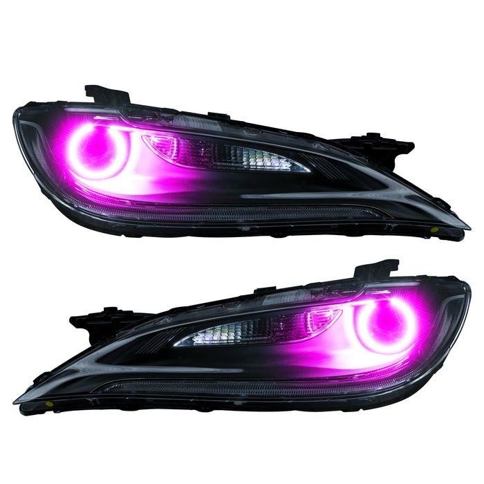 Chrysler 200 headlights with pink LED halo rings.