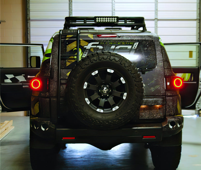 Rear veiw of Camo FJ Cruiser with ORACLE Lighting halos installed on tail lights