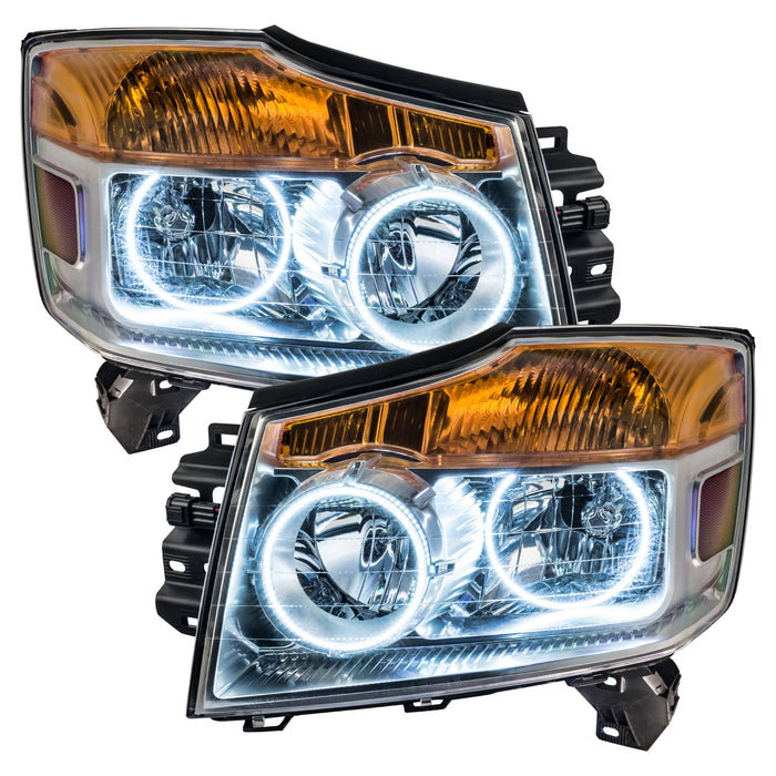 Nissan Titan headlights with white LED halo rings.