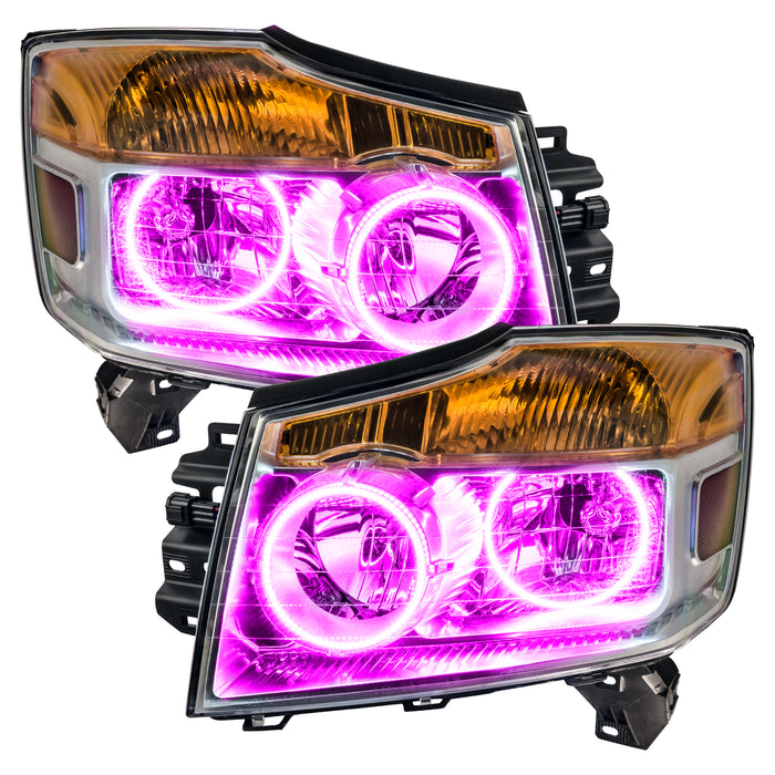 Nissan Titan headlights with pink LED halo rings.