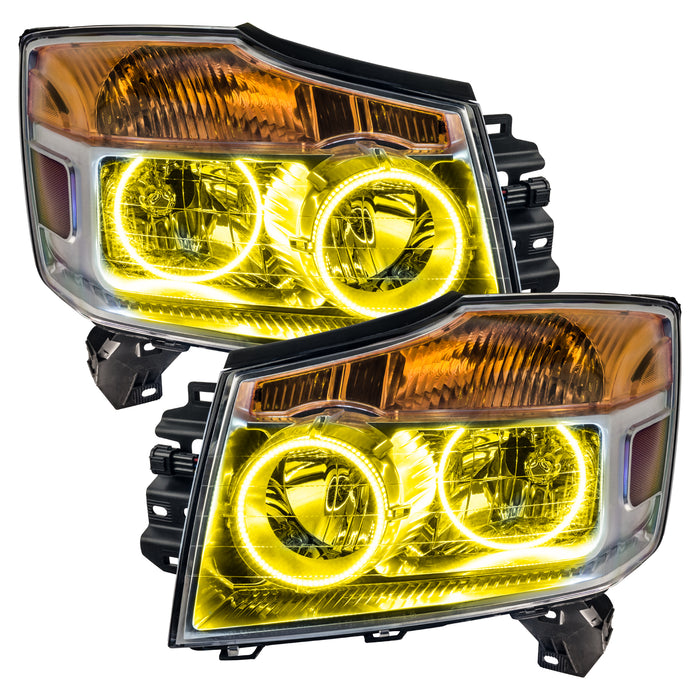 Nissan Titan headlights with yellow LED halo rings.