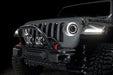 Front end of a Jeep equipped with 7" Multifunction LED Spotlights.