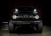Front view of a black Ford Bronco with 2 7" Multifunction LED Spotlights installed on the dash.