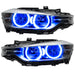 BMW 320 headlights with blue LED halo rings.