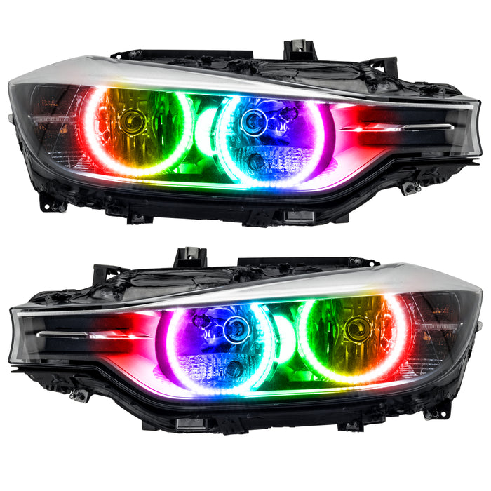BMW 320 headlights with ColorSHIFT LED halo rings.
