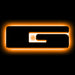 The letter "G" Amber LED Illuminated Letter Badge with matte black finish.