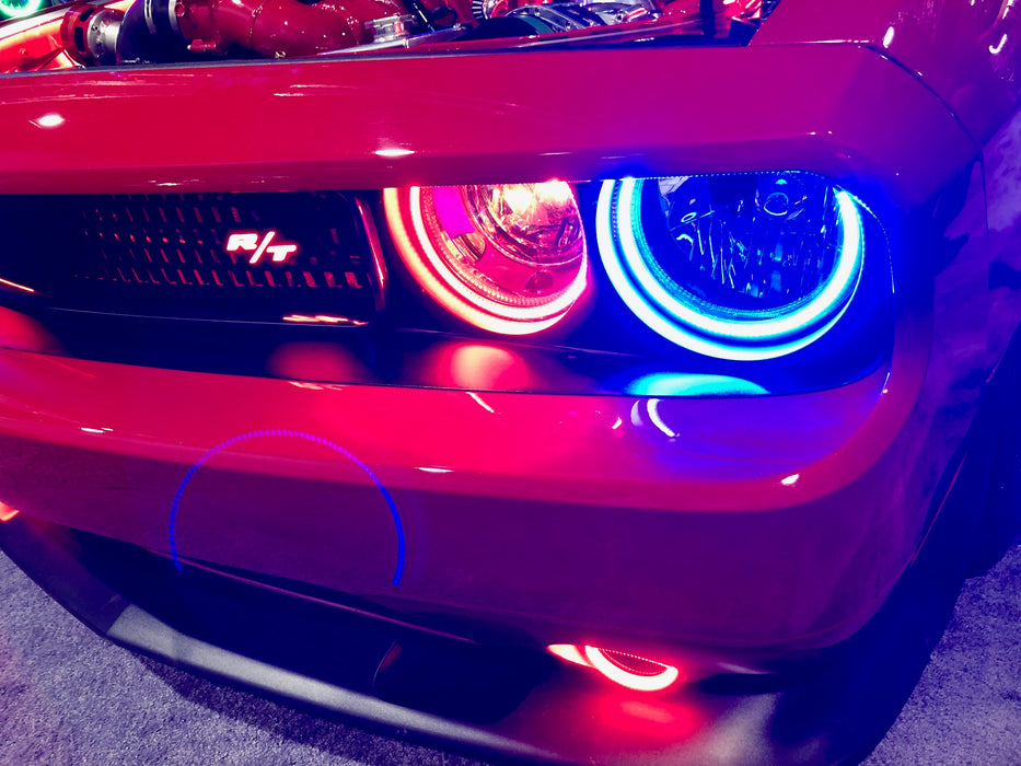 Close-up of challenger headlights with red and blue halos