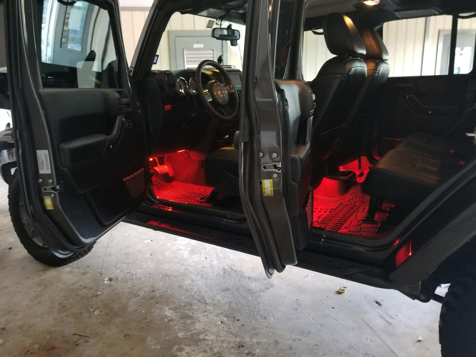 Jeep doors open with red LED footwell lighting