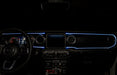 View of a Jeep dashboard from the backseat, with white fiber optic lighting installed.