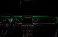 View of a Jeep dashboard from the backseat, with green fiber optic lighting installed.