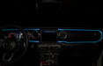 View of a Jeep dashboard from the backseat, with cyan fiber optic lighting installed.