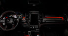 View of a RAM TRX dashboard from the backseat with red LED ambient lighting kit.