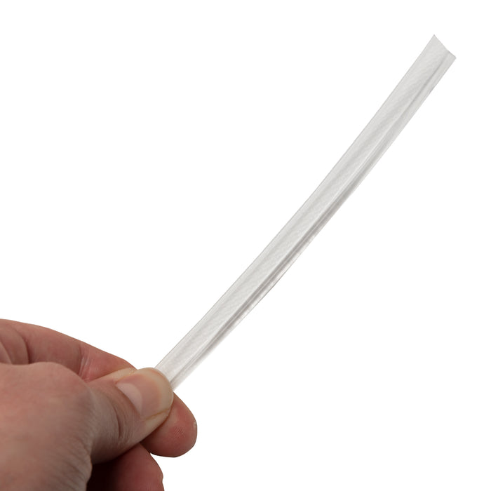 Hand holding a fiber optic strip
