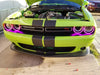 Front end of a green Dodge Challenger with pink LED headlight halo rings installed.