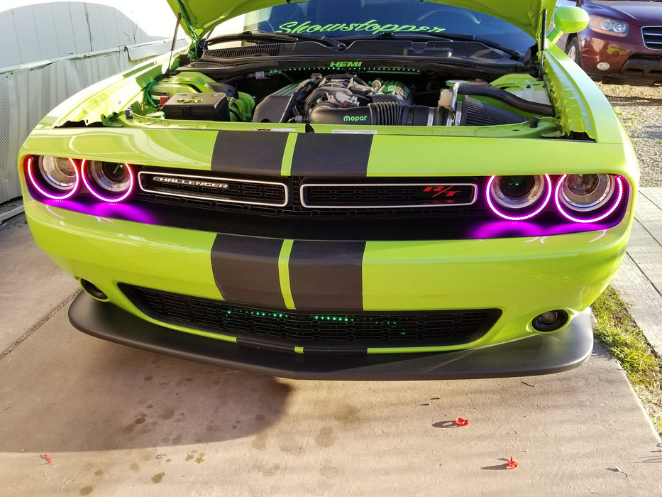 Green challenger with engine exposed and pink halo headlights